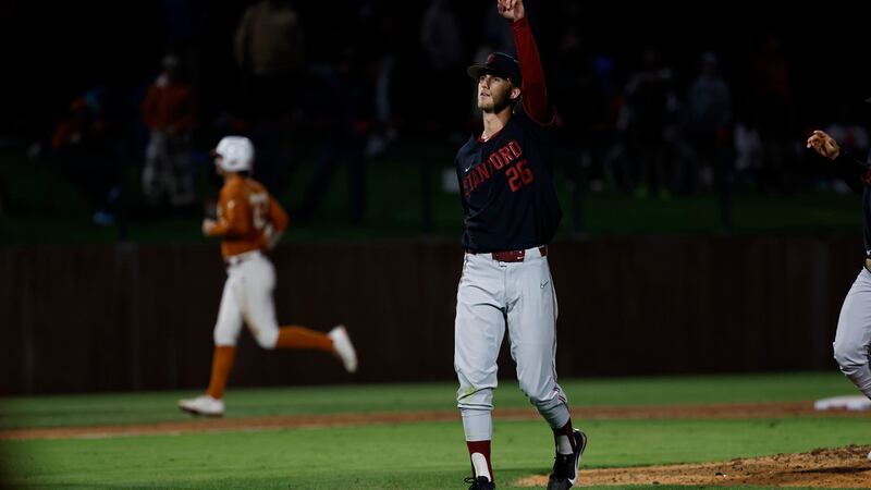 Stanford pitcher Quinn Mathews (26) celebrates against Texas in the ninth inning of an NCAA...