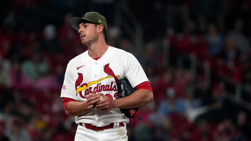 St. Louis Cardinals starting pitcher Steven Matz pauses after giving up an RBI double to Los...