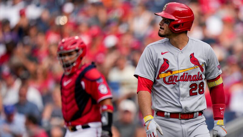 St. Louis Cardinals third baseman Nolan Arenado (28) walks to the dugout after batting during...