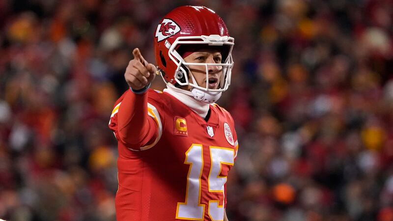 FILE: Kansas City Chiefs quarterback Patrick Mahomes signals teammates during the first half...