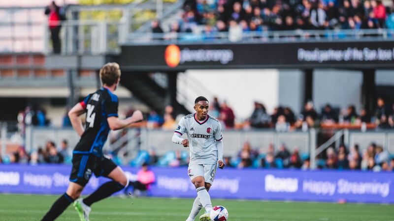 Midfielder Njabulo Blom makes a through ball pass against San Jose.
