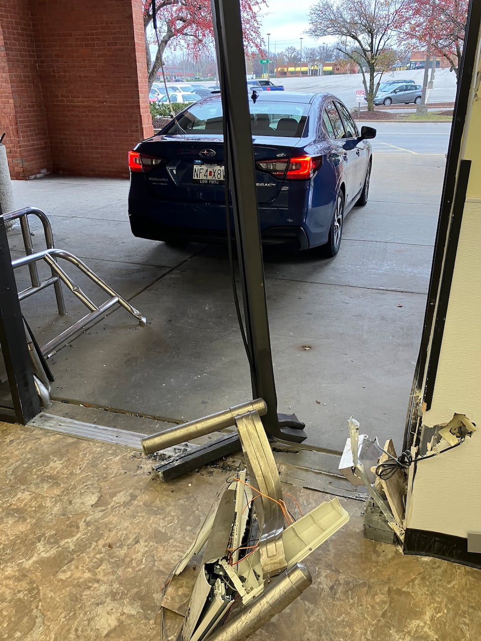 The front door of a Family Dollar was broken after a car drove through it during a theft.