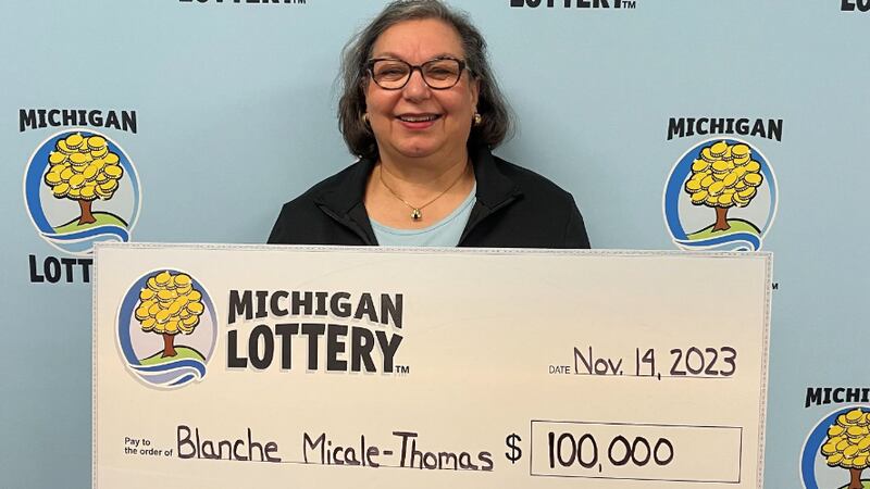 Blanche Micale-Thomas earned entries into a random drawing that took place Nov. 2 by scanning...