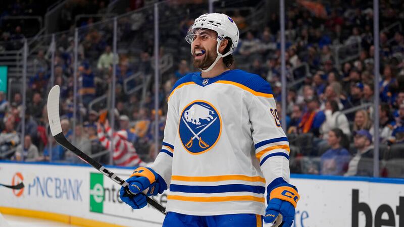 Buffalo Sabres' Alex Tuch celebrates after scoring during the first period of an NHL hockey...