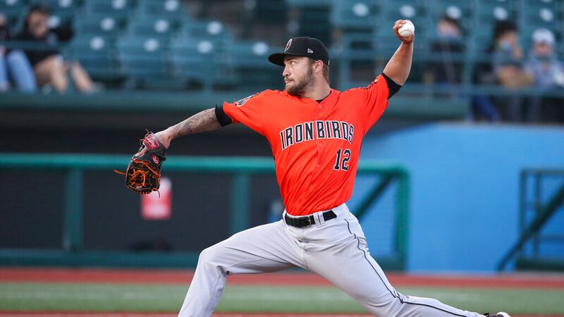 Then Aberdeen IronBirds pitcher Drew Rom (12) throws during a minor league baseball game...