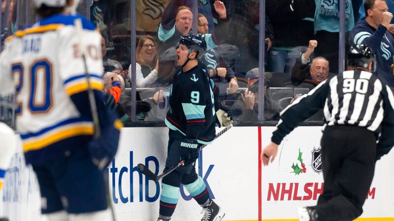 Seattle Kraken forward Ryan Donato celebrates after scoring a goal against the St. Louis Blues...