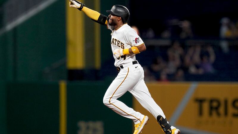 Pittsburgh Pirates' Joshua Palacios rounds the bases after hitting a three-run home run off...