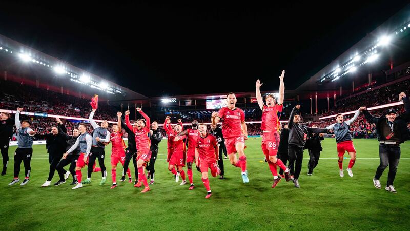 CITY SC celebrates in front of fans after beating Charlotte FC 3-1.