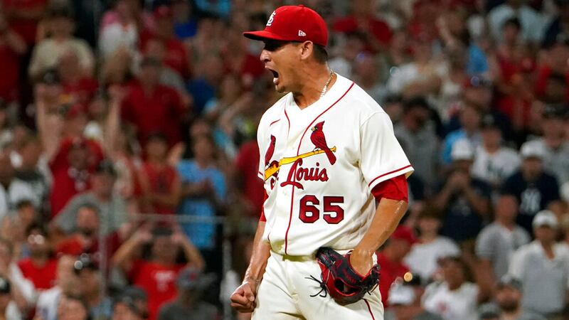 St. Louis Cardinals relief pitcher Giovanny Gallegos celebrates after striking out New York...