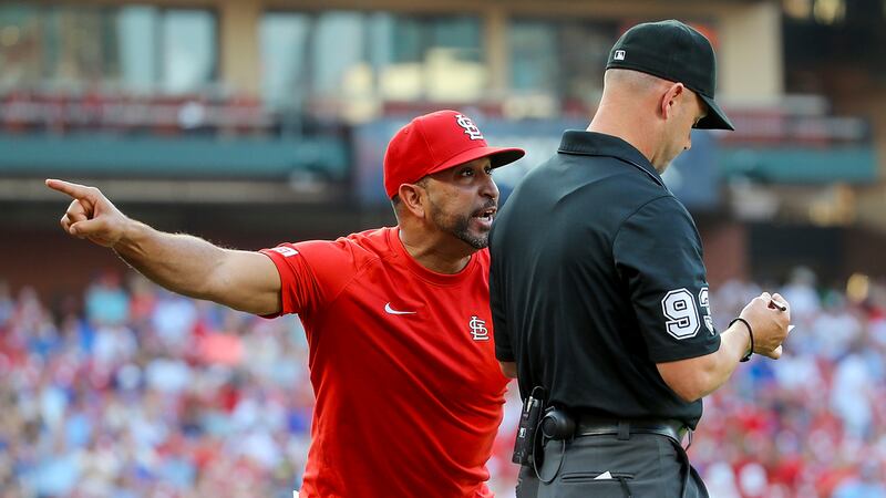 St. Louis Cardinals manager Oliver Marmol argues with umpire Will Little (93) after Miles...