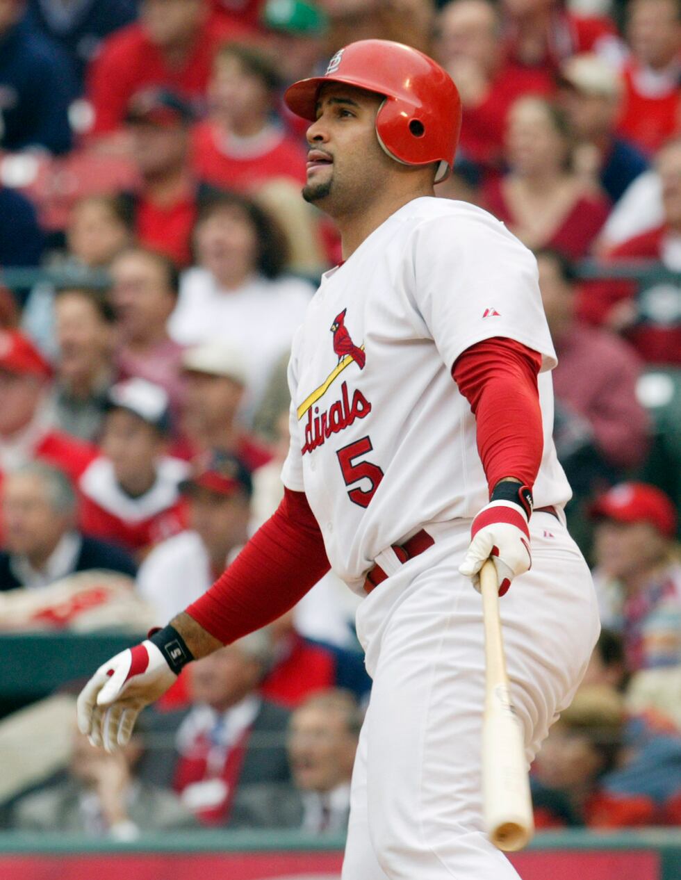 St. Louis Cardinals' Albert Pujols watches his first -inning, two- run home run off Houston...