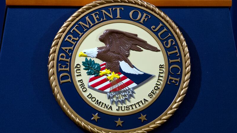 FILE - The Department of Justice seal is seen in Washington, Nov. 28, 2018. The Justice...