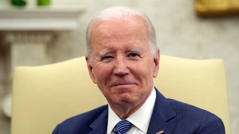 FILE - President Joe Biden listens as he meets with Denmark's Prime Minister Mette Frederiksen...