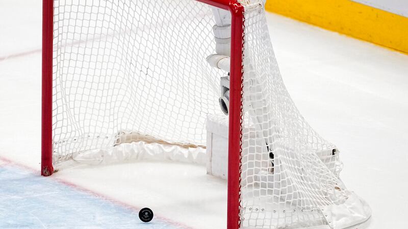 The puck crosses the line into the net on an empty net goal scored by Toronto Maple Leafs'...