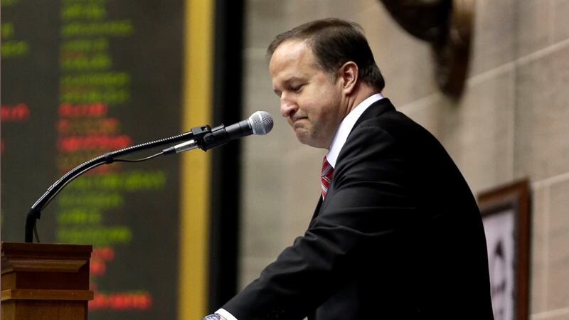 FILE - Missouri House Speaker John Diehl pauses before stepping down from the dais after...