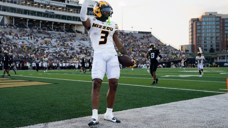 Missouri wide receiver Luther Burden III (3) celebrates a touchdown against Vanderbilt in the...