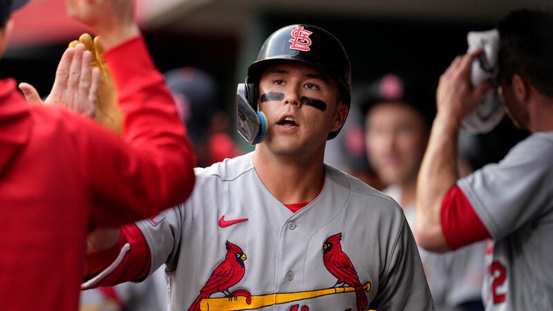 St. Louis Cardinals' Lars Nootbaar, center, celebrates with teammates after hitting a solo...
