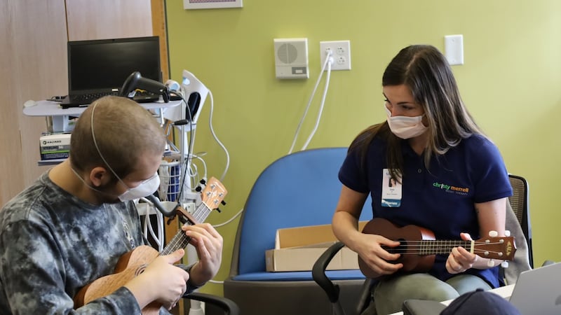 A Friends of Kids with Cancer patient in the music therapy program.