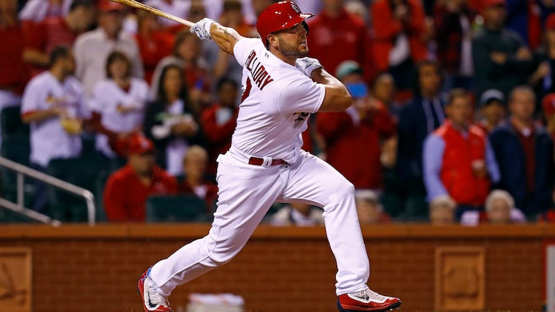 St. Louis Cardinals' Matt Holliday watches his home run to right field during the seventh...