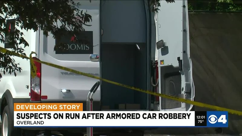 Three men are charged in the robbery of an armored car at a supermarket in Overland. File...